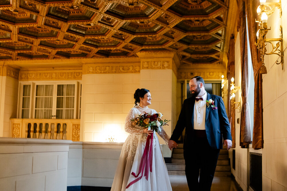 Bride and Groom Walking in the Mezzanine at the Omni William Penn Pittsburgh
