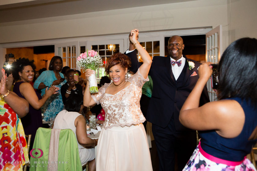 Happy bride and groom walking into reception at the Edgewood Club Pittsburgh Wedding Photography