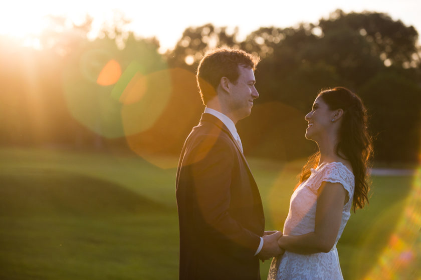 Bride and Groom at Sunset on Golf course
