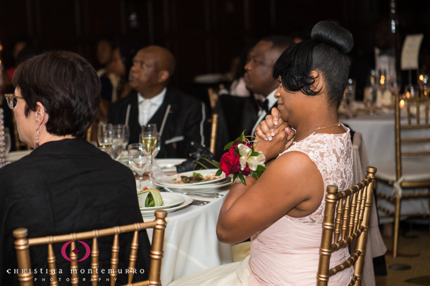 Mother of the bride listens to a speech