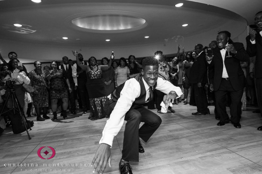 Groomsmen dancing at wedding reception