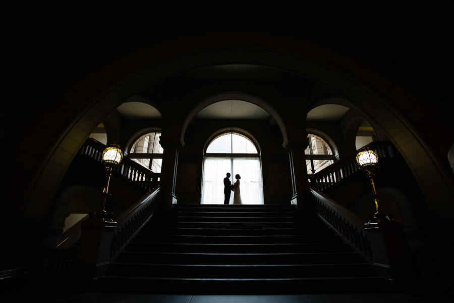 Bride and Groom Silhouette in front of the Windows in the Courthouse in Pittsburgh