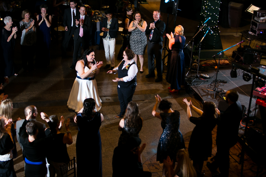 Brides in the Center of a Circle of Guests on the Dance Floor in the Great Hall