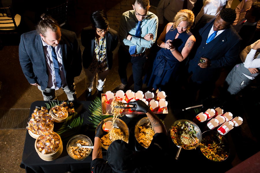Innovative Asian Food Station with Noodles Served in Takeout Containers by Common Plea Catering