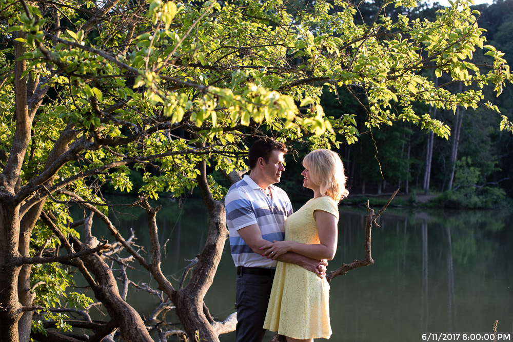 Bride to Be in Yellow Dress with Fiance Standing by Marshall Lake in North Park Pittsburgh